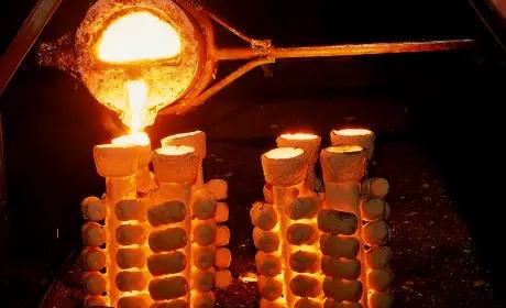 Investment casting process producing precision metal components